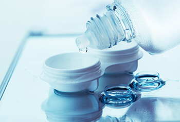 Closeup of Contact Lenses and Solution